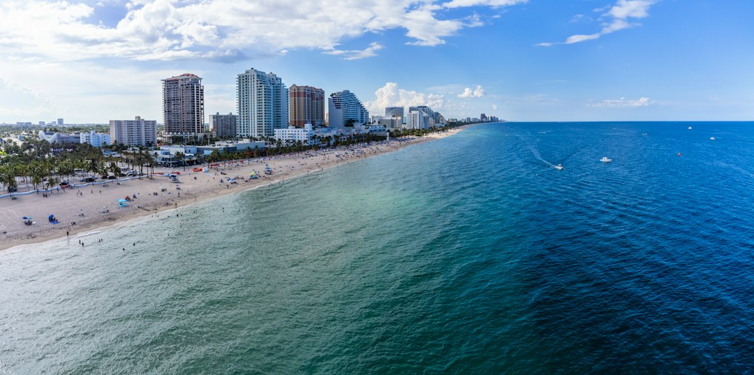 Aerial panorama of Fort Lauderdale beach, waterfront buildings, and blue ocean