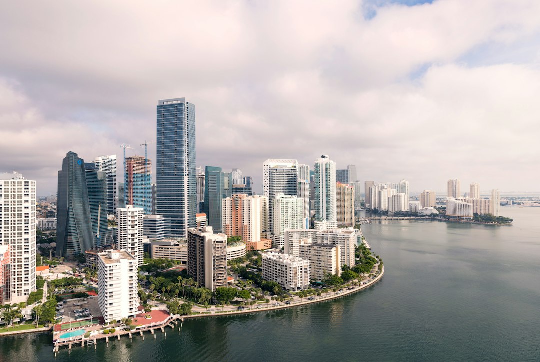 Aerial view of downtown Miami and Brickell apartment towers beside Biscayne Bay
