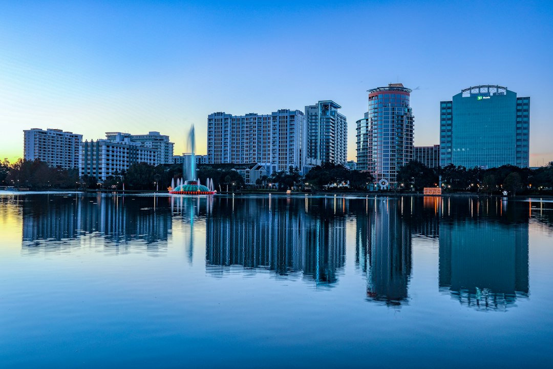 Orlando skyline reflected in Lake Eola in early morning light